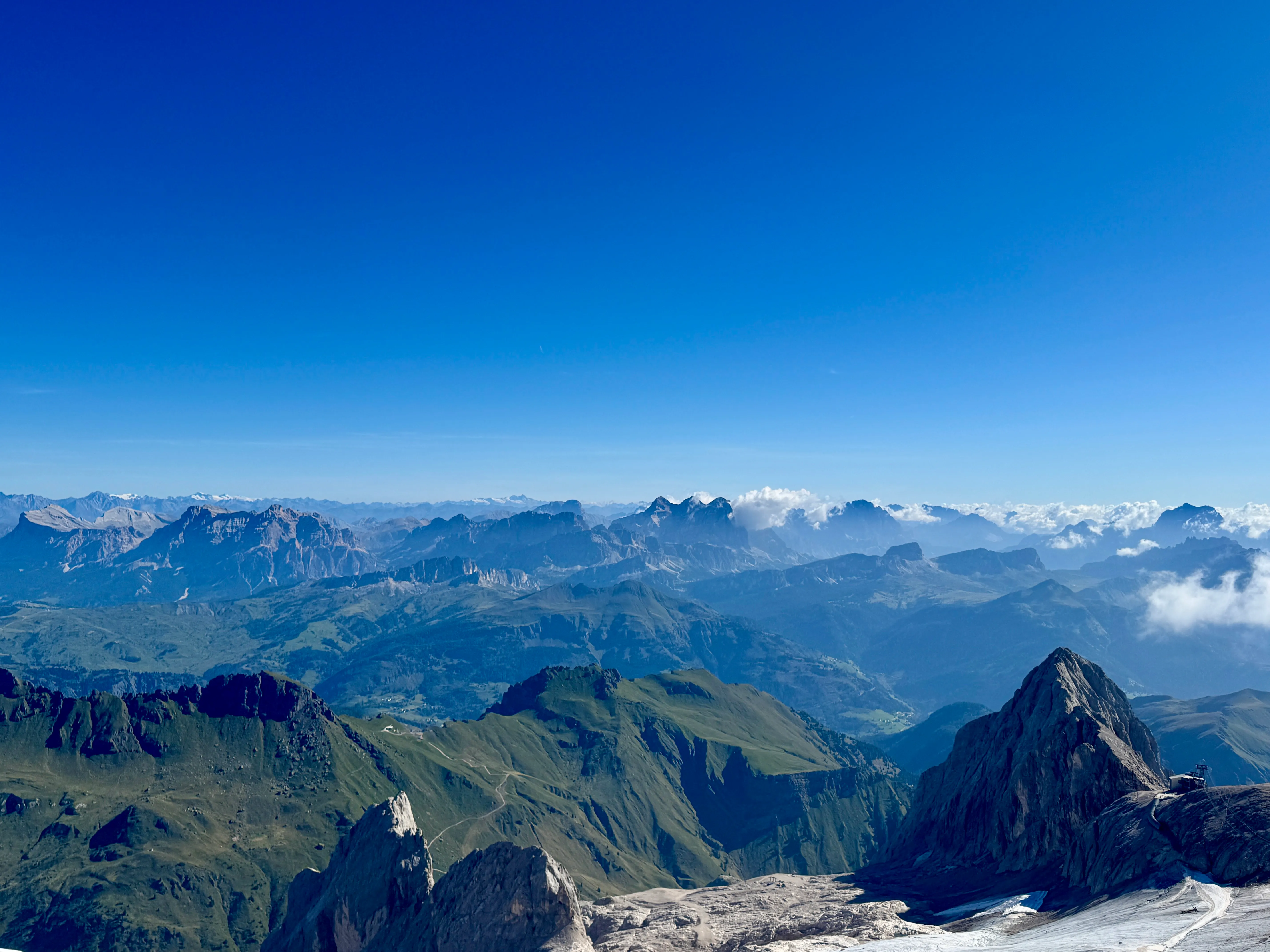 View of layered Dolomite peaks from the Marmolada cable car window