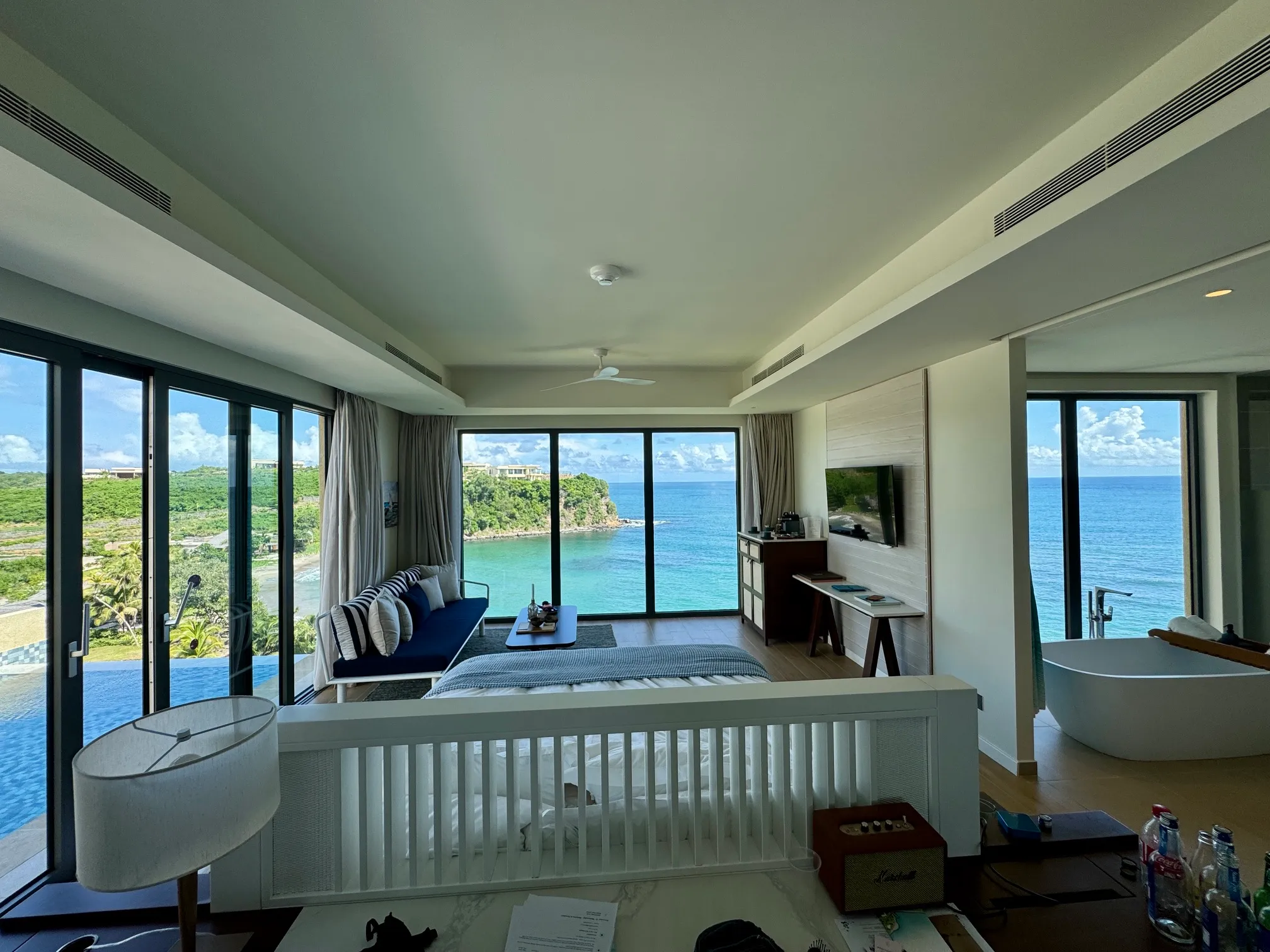 A pool suite at Six Senses La Sagesse looking out over the lagoon